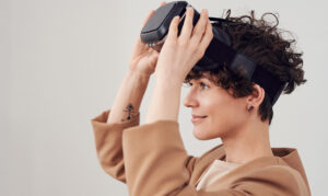 a woman wearing a VR system