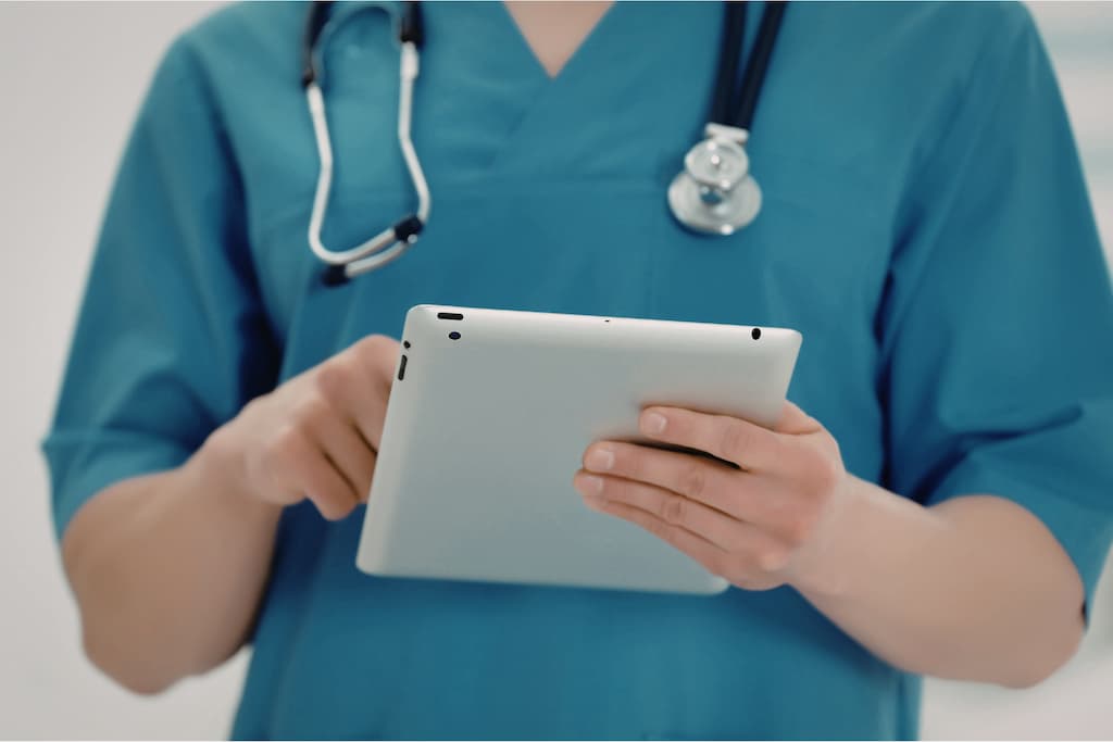 Doctor working with a tablet